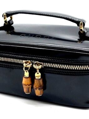 Authentic GUCCI Leather Black
Bamboo Vanity case